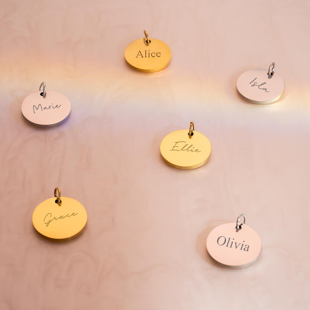 15 mm asta disc charm personalised with engraved names in silver and gold