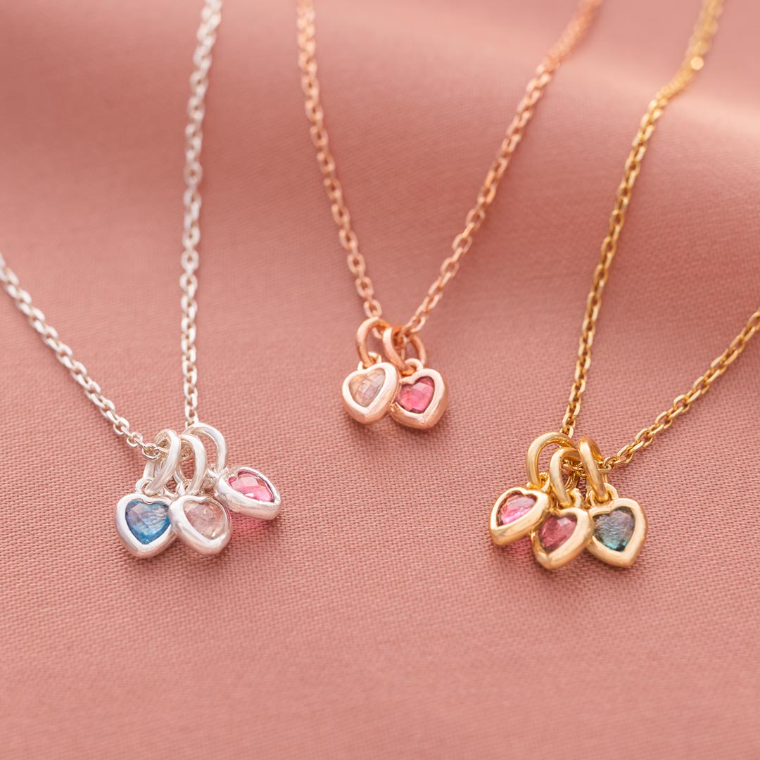 silver plated, rose gold plated and champagne gold plated family heart personalised necklace