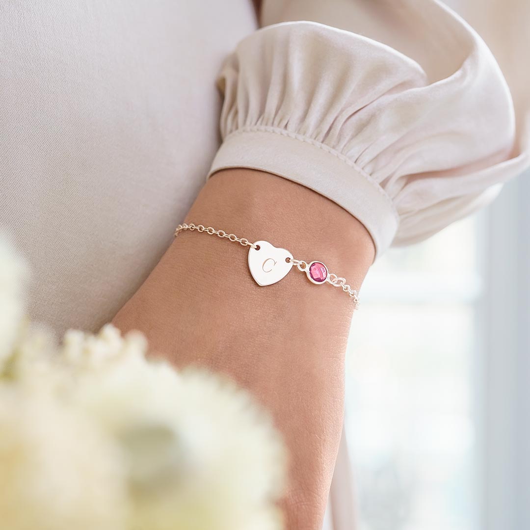 personalised heart bracelet with chosen initial and birthstone charm
