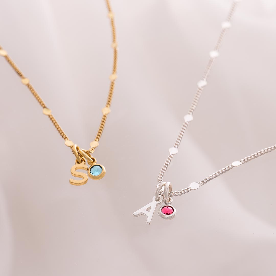 disc and trace mini letter and birthstone charm necklace available in silver and champagne gold 