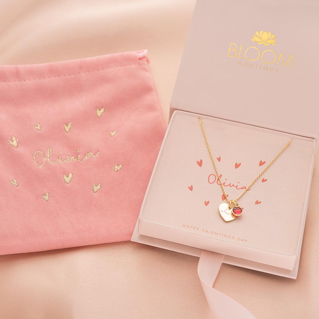 champagne gold esme heart and birthstone personalised necklace with embroidered suede gift pouch