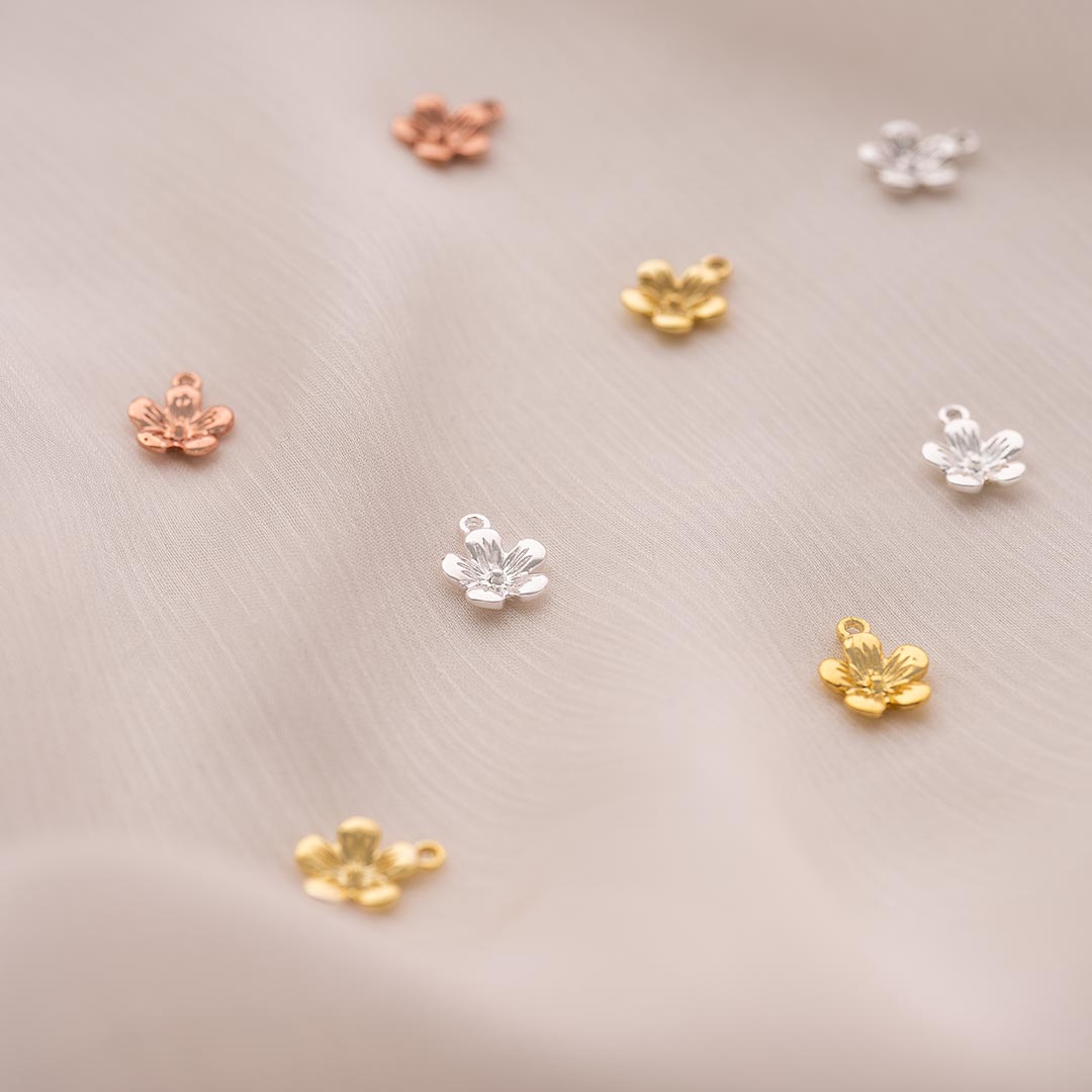 sterling silver, rose gold plated sterling silver and gold plated sterling silver 6mm flower charm