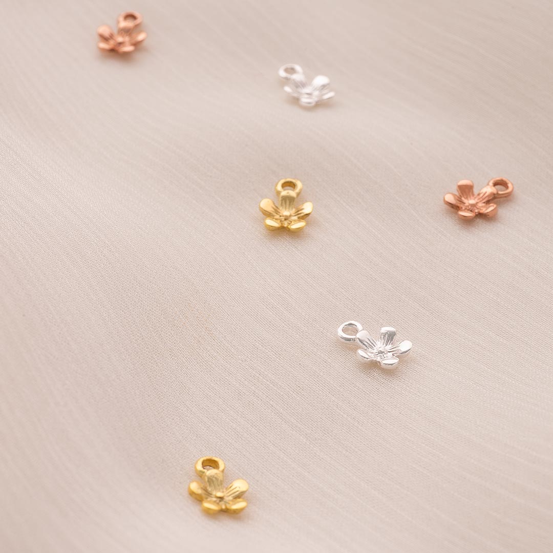 8mm flower charm available in sterling silver, gold plated sterling silver and rose gold plated sterling silver