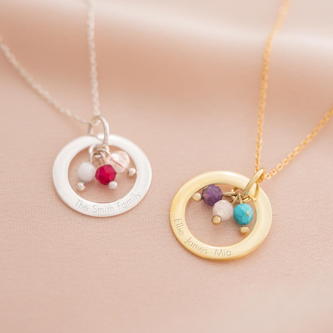 sterling silver and gold plated sterling silver eternal ring necklace with an engraved contemporary style message and semi-precious birthstone charms