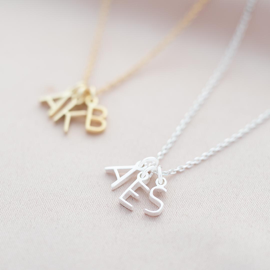 initial letter necklaces available in sterling silver and gold plated sterling silver