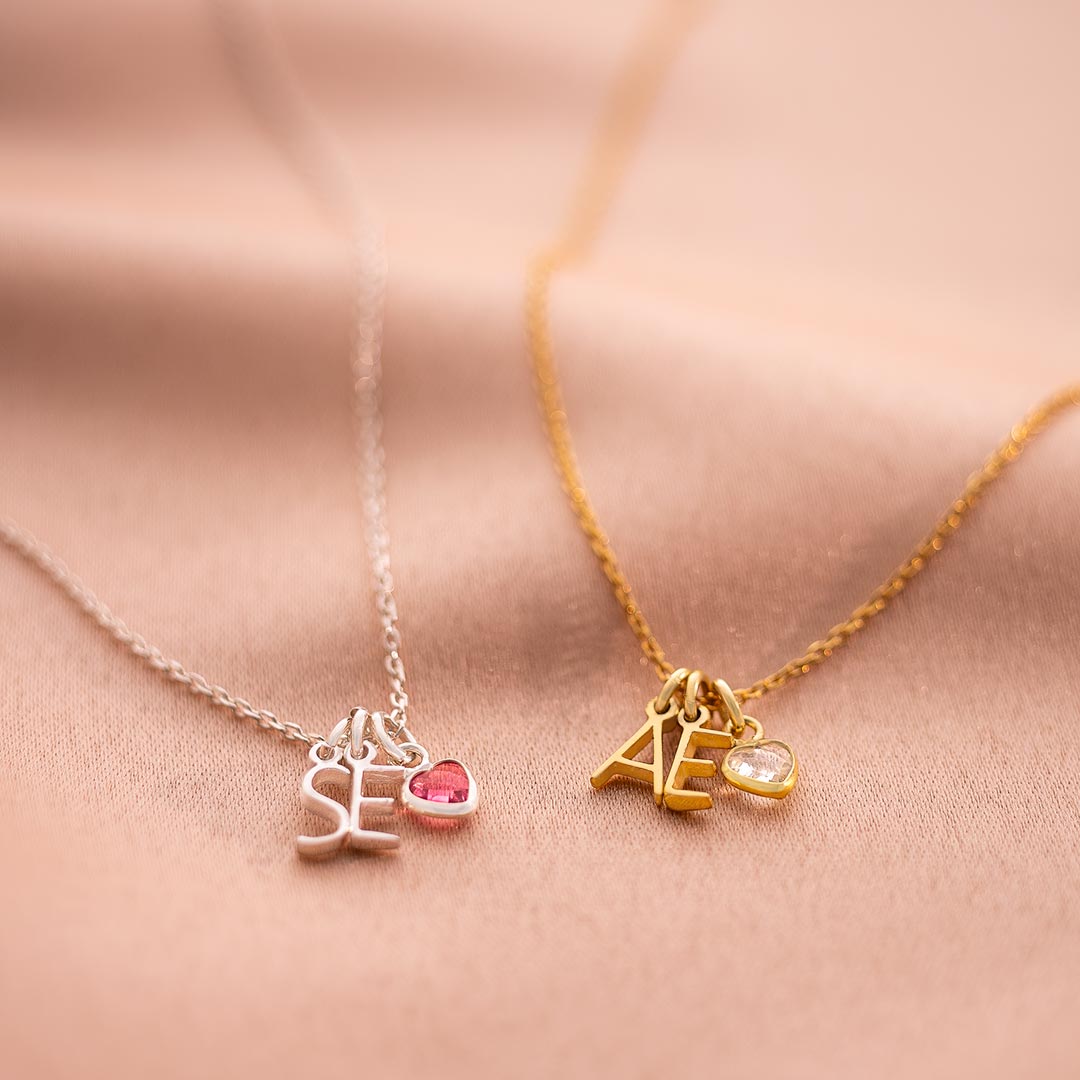 sterling silver and gold plated sterling silver letter and gemstone heart charm personalised necklace