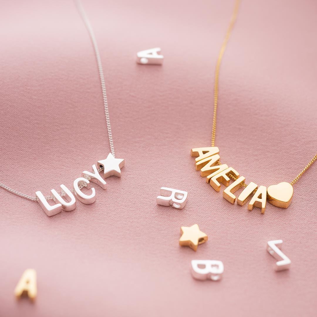 slide on name necklace personalised with up to 8 slide on letters in a sterling silver finish
